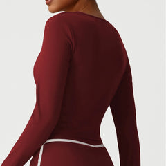 Maroon long-sleeve top worn by a person- back view