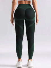 Green and black leggings worn by a person- back close-up