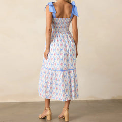Women's printed tiered midi dress with square neck.

