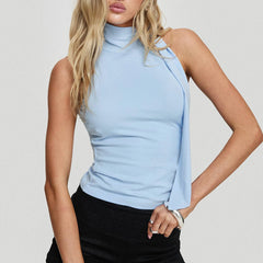 Model displaying a mock neck tie-up tank top in a solid color.