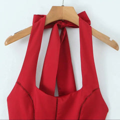 Halter bow seam pleated mini dress.