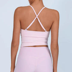 Light pink strappy top worn by a person - back view