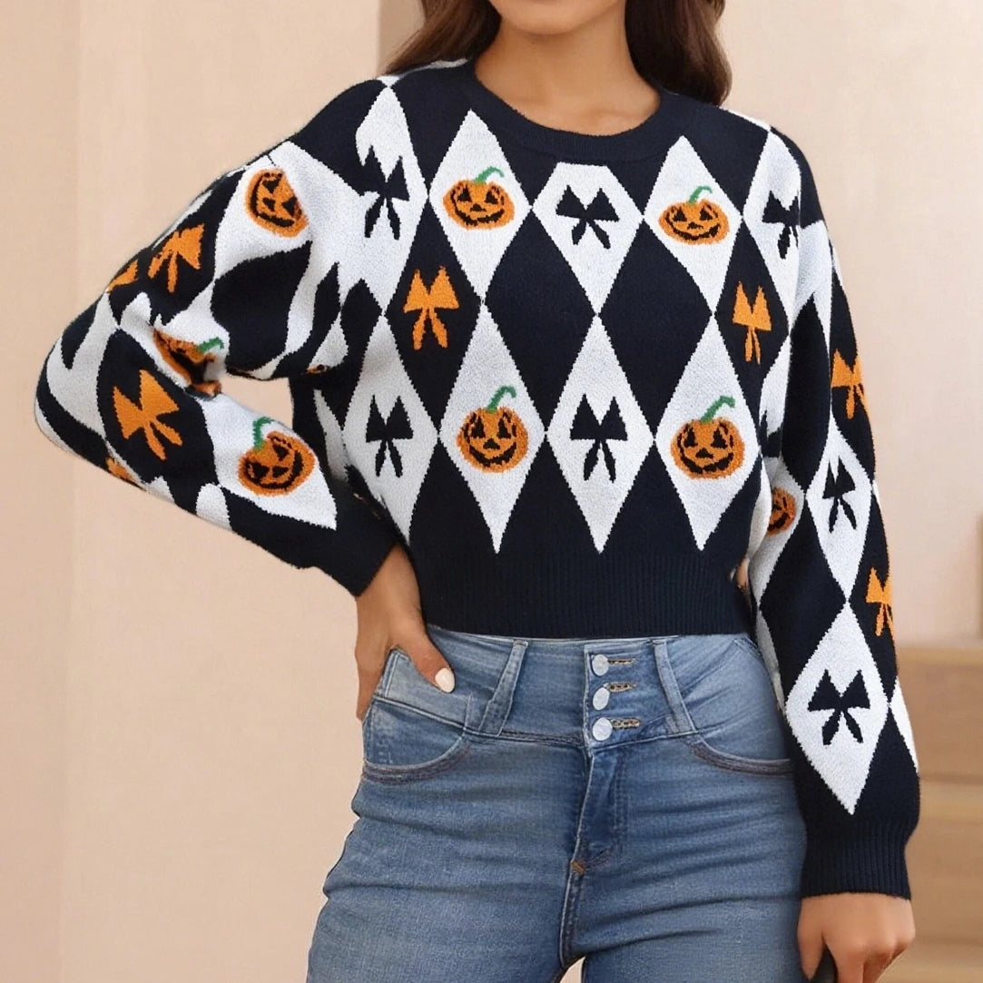 Person wearing a Halloween-themed sweater with pumpkins and bows 