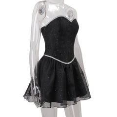 Black dress with silver trim on a mannequin 
