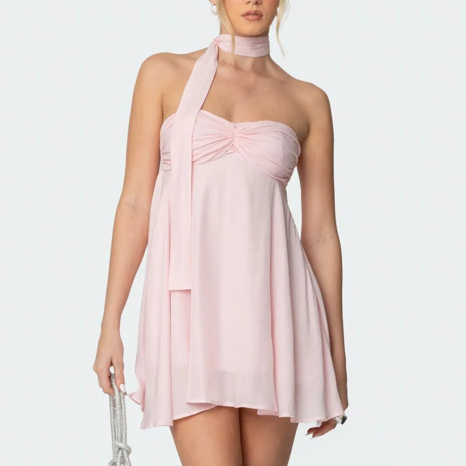 Women's pink bandeau scarf mini dress with floral print and A-line silhouette.


