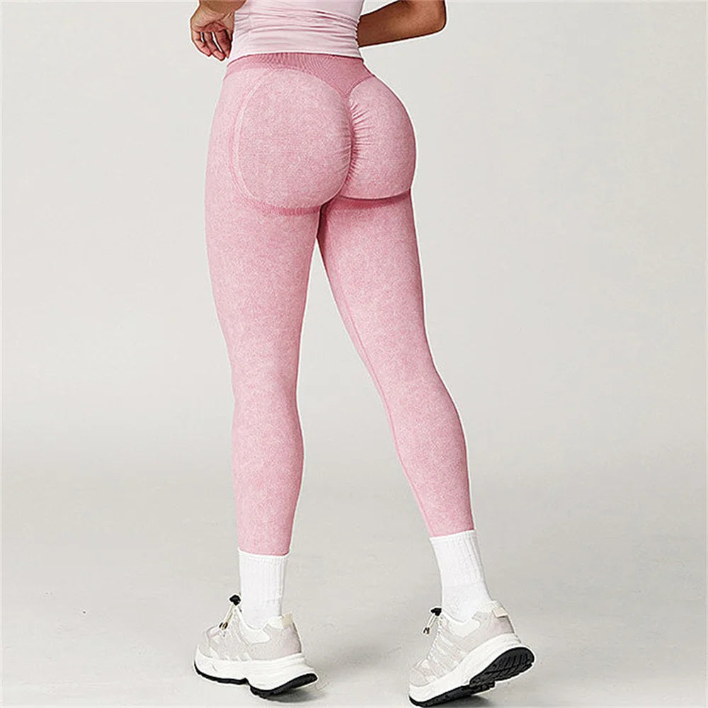 Person wearing pink leggings - back view