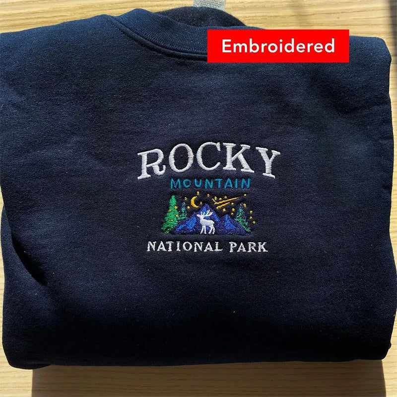 Women's Rocky Mountain National Park embroidered sweatshirt.