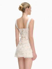 Printed Strap Lace-up Top And Mini Floral Bow Skirt Set