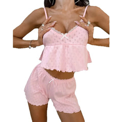 Pink lace lingerie set with shorts on a white background