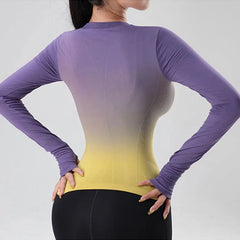 Person wearing a gradient long-sleeve top transitioning from purple to yellow - back