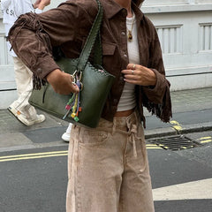  Brown suede jacket with tassels for women.