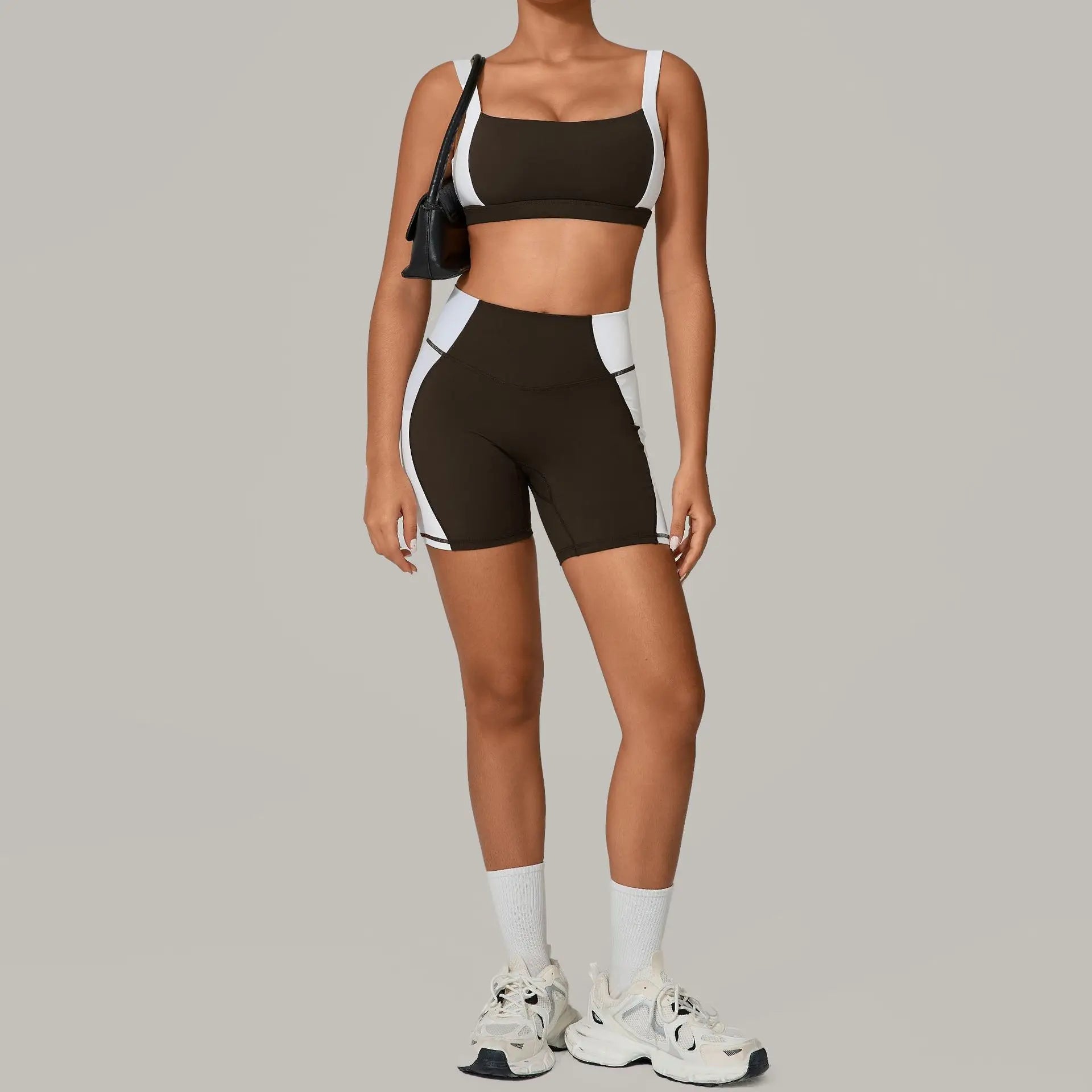 Person wearing a black and white athletic outfit