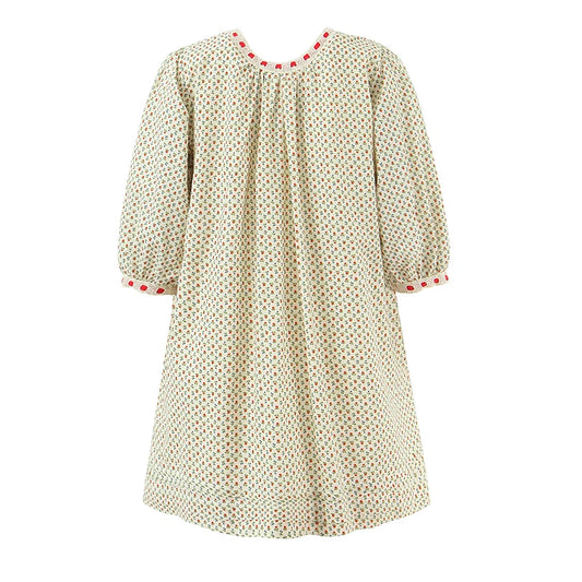 Beige dress with red accents on a white background