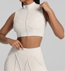 White zip-up athletic top worn by a person - close-up