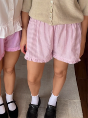 Women's elastic waist striped plaid print shorts.

