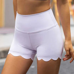 White shorts with scalloped edges worn by a person