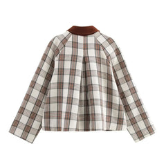 Plaid shirt with brown collar on a white background
