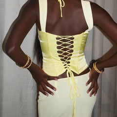 A stylish satin two-tone top with wide straps.