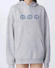 Gray hoodie with blue shell designs 