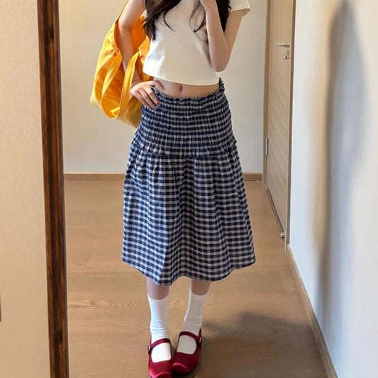 Women's blue elastic high waist plaid skirt with A-line silhouette.

