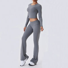 Person wearing a gray athletic outfit - side view