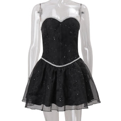 Black dress with silver embellishments on a mannequin 