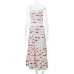 White dress with orange fish pattern on a white background