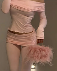 Feminine off-shoulder lounge set in blush pink with ruched pants — Pilates girlie outfit trending in Germany and Canada.