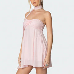 Women's pink bandeau scarf mini dress with floral print and A-line silhouette.

