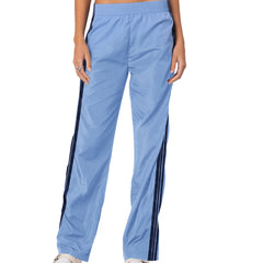 Light blue track pants with dark blue stripes