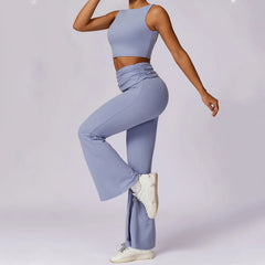 Person wearing a light blue athletic outfit with white sneakers