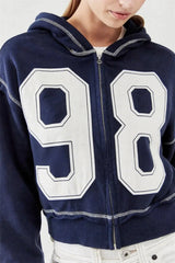 Navy blue hoodie with large white numbers '98' on a plain background