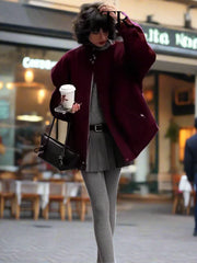 Women's baseball jacket in burgundy.