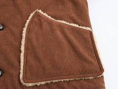 Women's corduroy jacket with fur lining and turn-down collar.