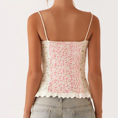 Floral patterned top worn by a person - back