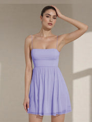 Woman wearing a light purple dress - fit & flare