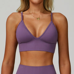 Purple sports bra worn by a person -close-up
