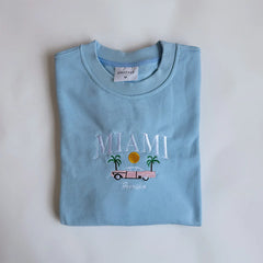  Women's Miami embroidered sweatshirt with an automobile graphic.