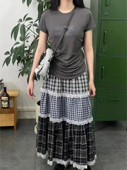 Women's patchwork lace plaid high waist long skirt with A-line silhouette.

