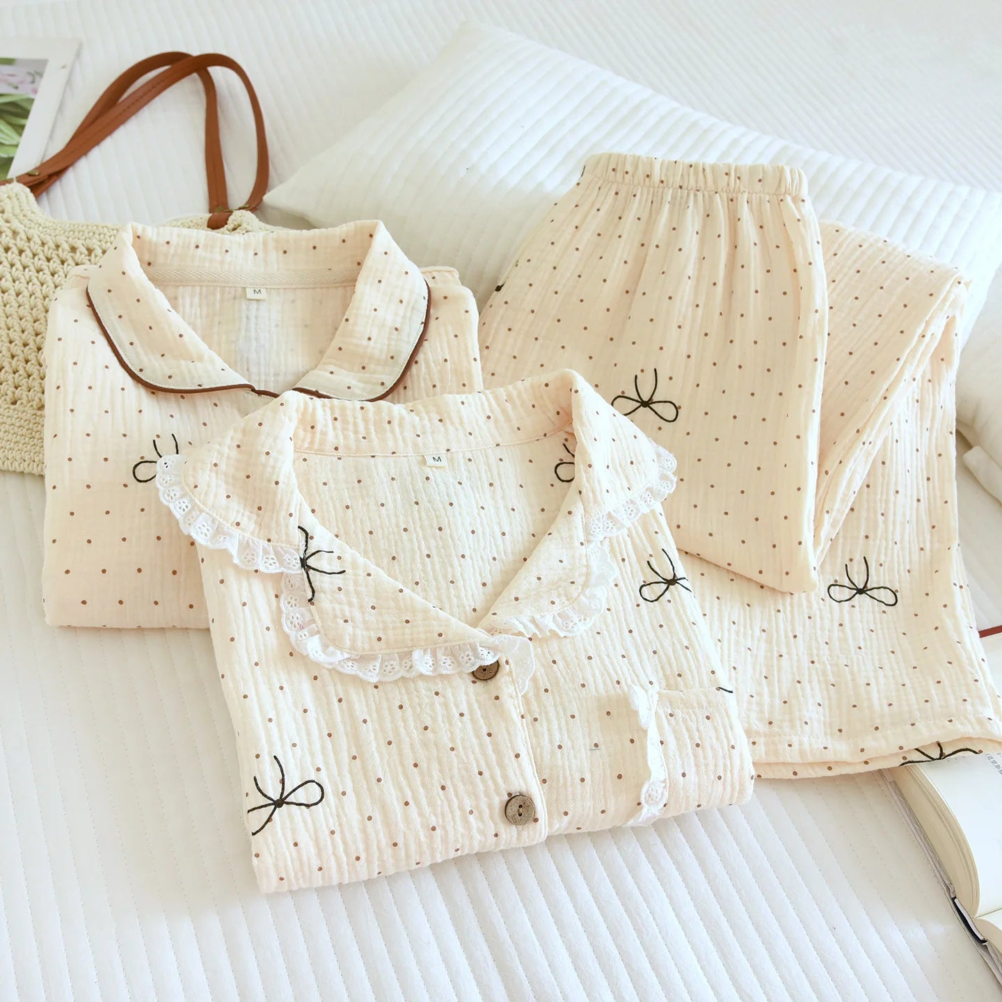 pajama set with bow details on a white background