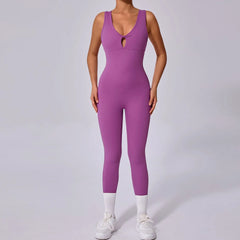 Purple jumpsuit worn by a person- front view