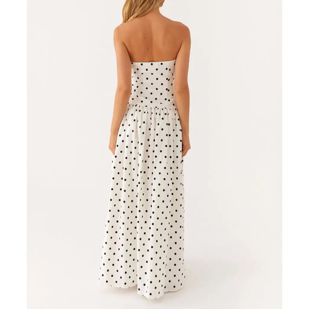 Women's strapless dot/floral print pleated tube long dress with A-line silhouette.

