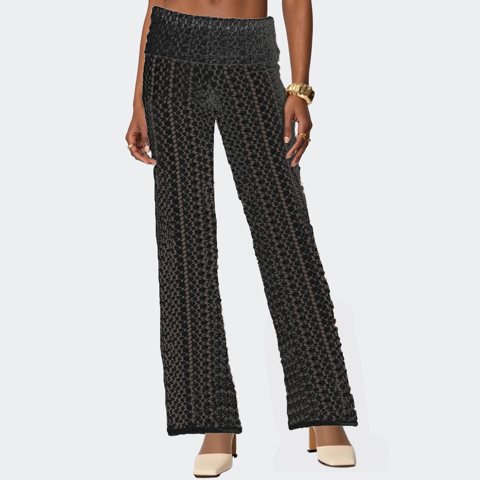 Patterned pants worn by a person on a light gray background