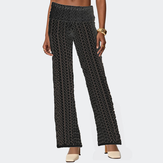 Patterned pants worn by a person on a light gray background