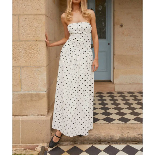 Women's strapless dot/floral print pleated tube long dress with A-line silhouette.

