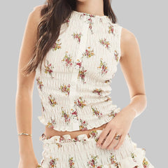 Woman wearing a floral dress - smocked