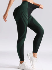 Green and black patterned leggings worn by a person- elastic details
