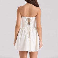 Women's white solid flare bustier mini dress with A-line silhouette.

