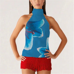 Woman wearing a blue floral halter top and red shorts