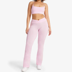 Person wearing a pink athletic outfit - front